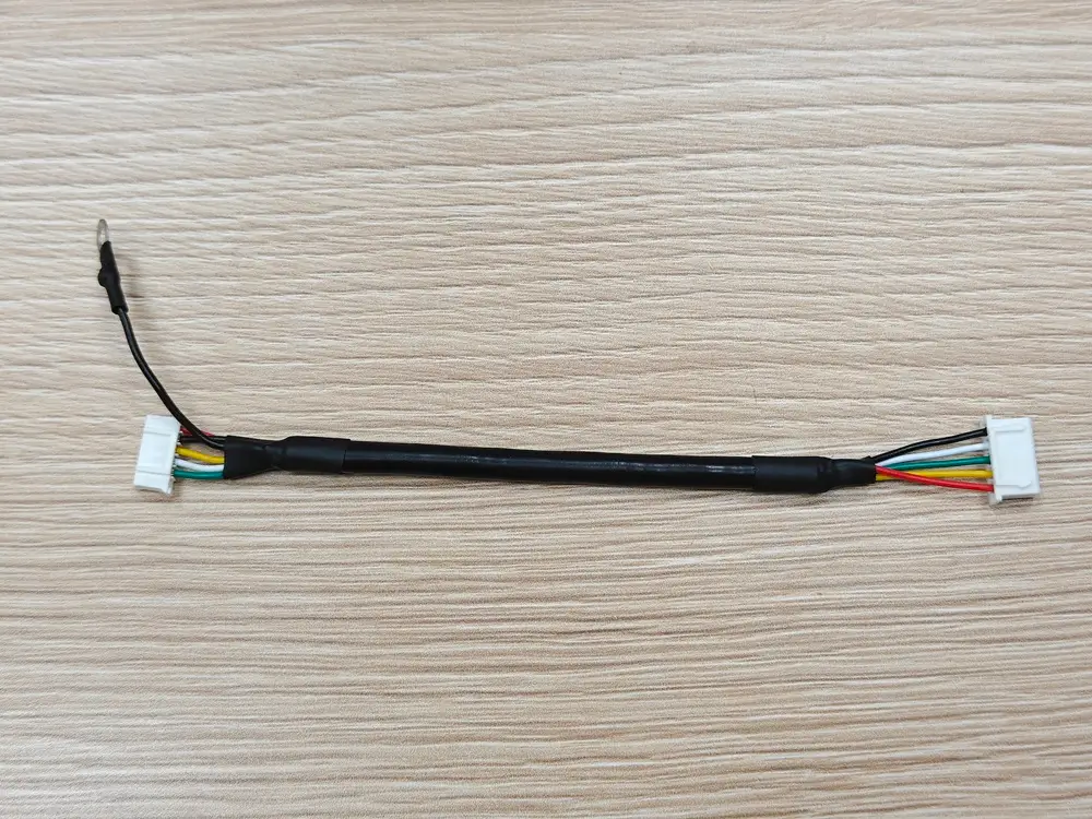XH-to-PH cable assembly with alternative connector housings and an additional visible ring-terminal lead