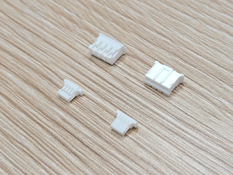 Angled view of alternative PH housings in the upper row and SH housings in the lower row