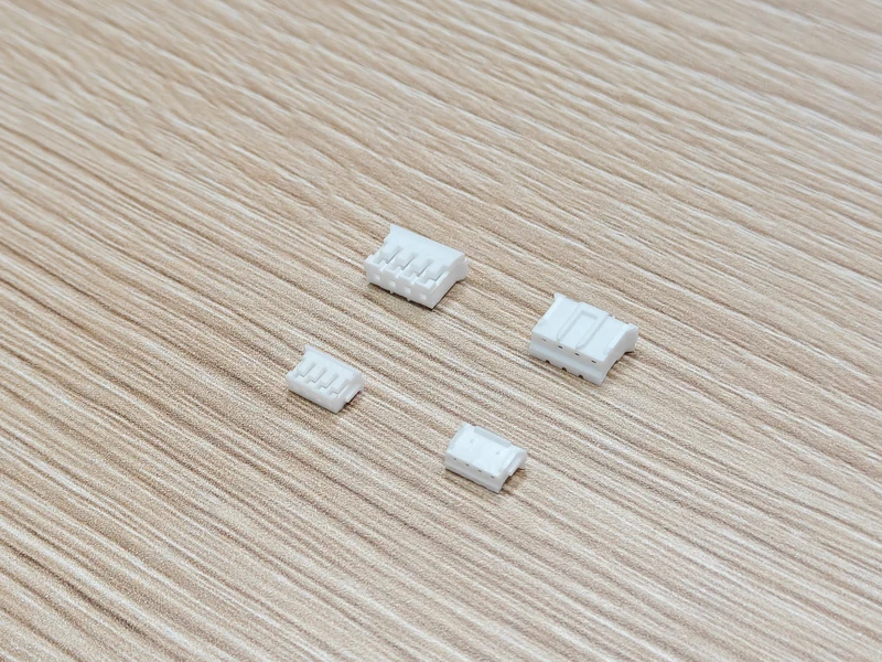 Angled view of alternative PH housings in the upper row and ZH housings in the lower row