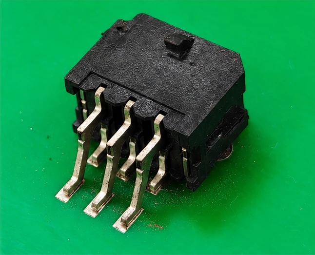 Right-angle SMT header sample, showing the board attachment and mating direction